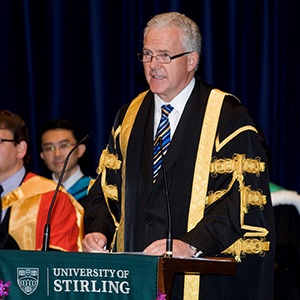 Photo of Gerry McCormac making a speech at the University of Stirling